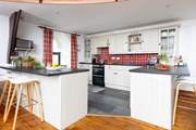 The kitchen is a sociable space to gather round.