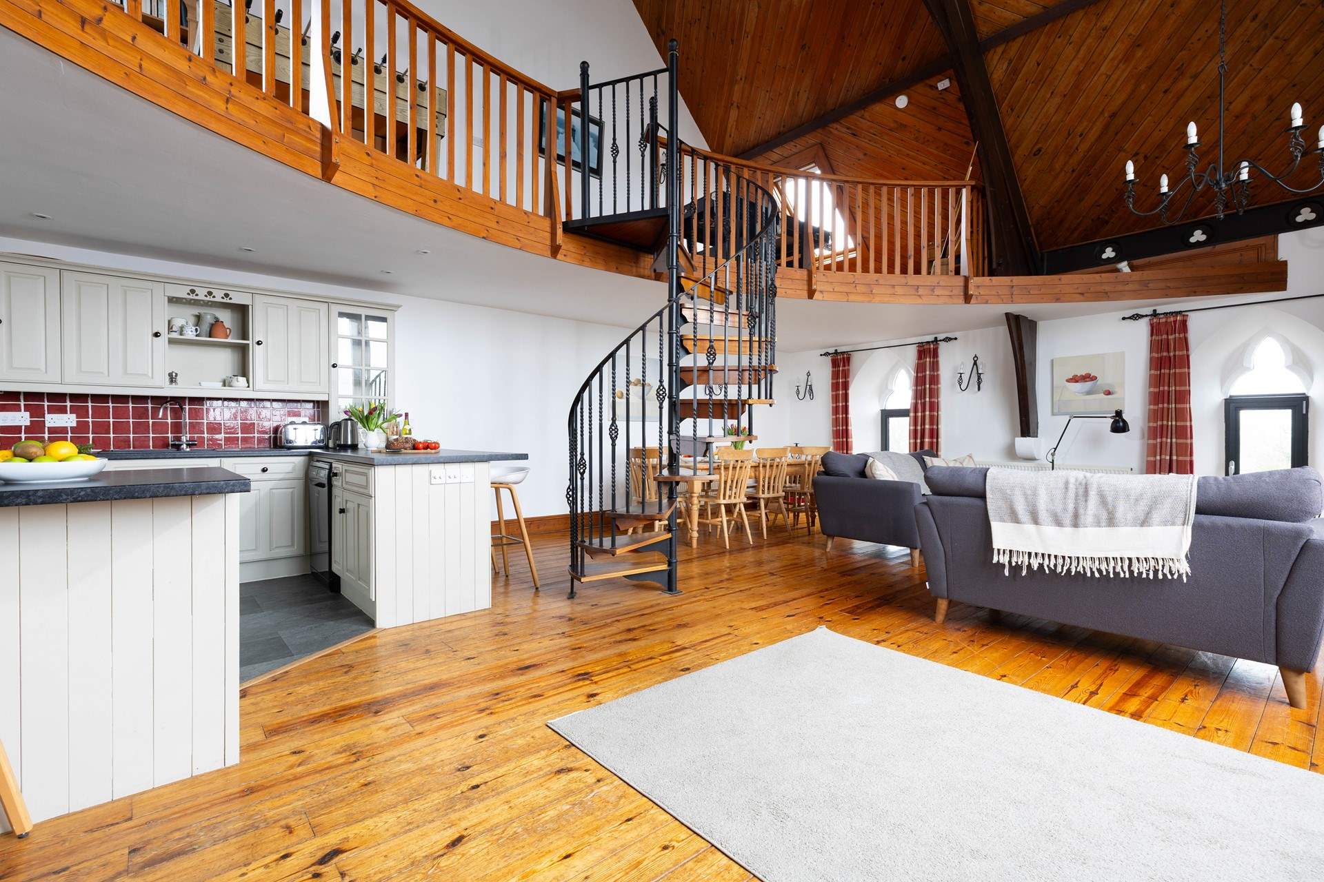 The open plan living-room with kitchen and dining area.