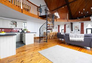 The open plan living-room with kitchen and dining area.
