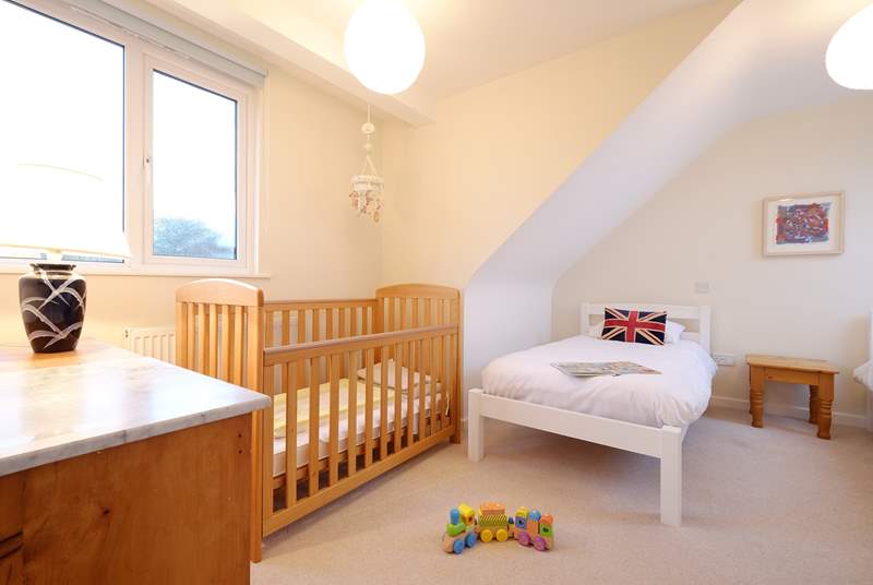 The twin bedroom has a cot should you require.