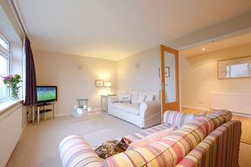 The sitting-room is a lovely relaxing space.