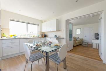 The light and bright kitchen and dining-area.