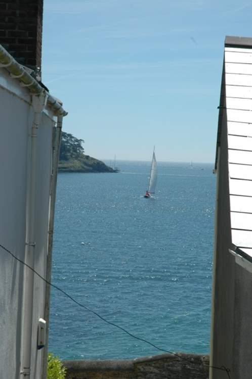 Watch the boats sail by from the property.