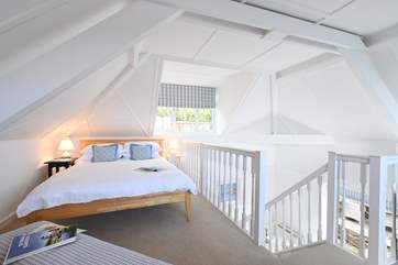 The beautiful galleried double bedroom.