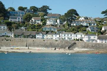 Tavern Beach. A glimpse of The Studio can be seen tucked up the alley to the left of the house opposite the steps down to the beach.