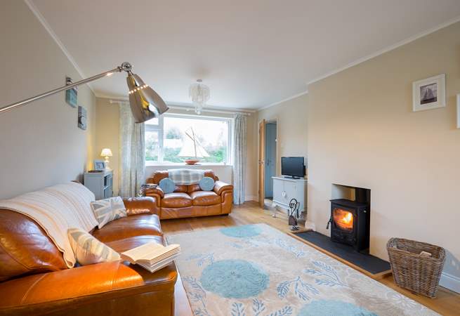 The sitting-room with cosy wood-burner.