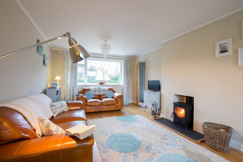 The sitting-room with cosy wood-burner.