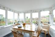 The dining-area with access to the patio so you can choose to dine in or out depending on the weather.