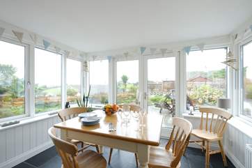 The dining-area with access to the patio so you can choose to dine in or out depending on the weather.