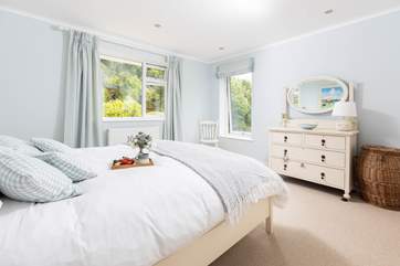 Delightful bedroom 2 has a king-size bed and en suite shower room.