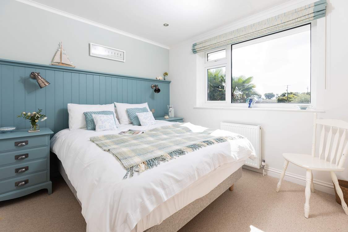 Delightful bedroom 3 has a king-size bed.