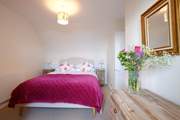 The bedrooms are nicely furnished.