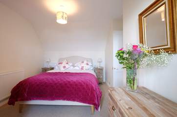 The bedrooms are nicely furnished.