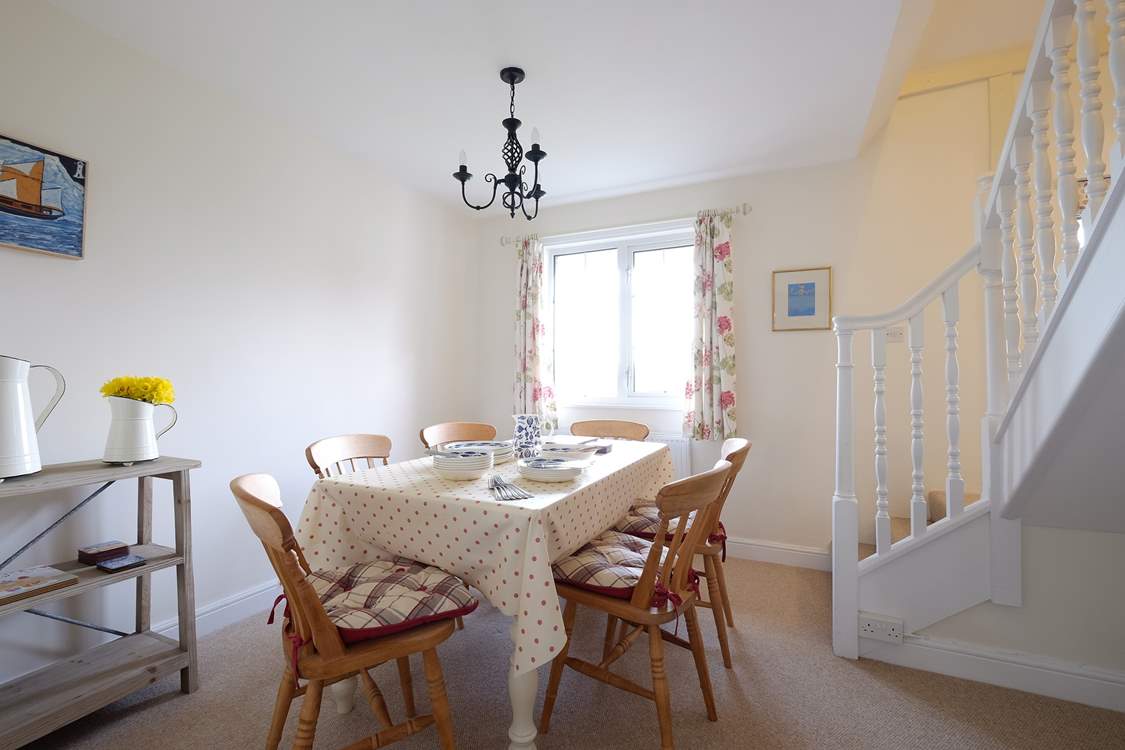 The bright and cheery dining-room.