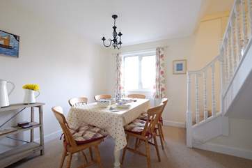 The bright and cheery dining-room.