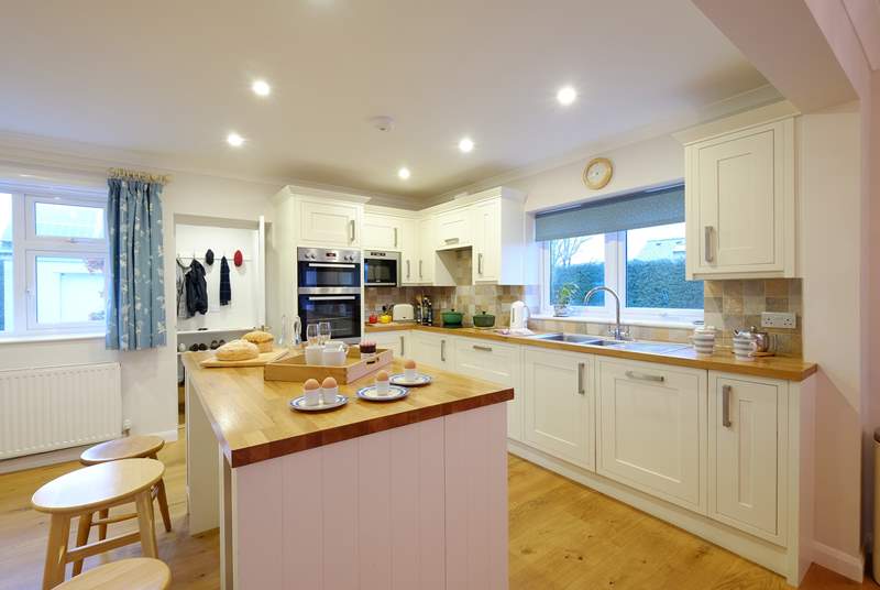The spacious kitchen/dining-room is light and bright.