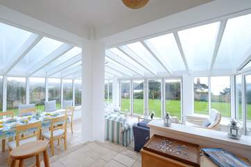 The conservatory for dining and relaxing.