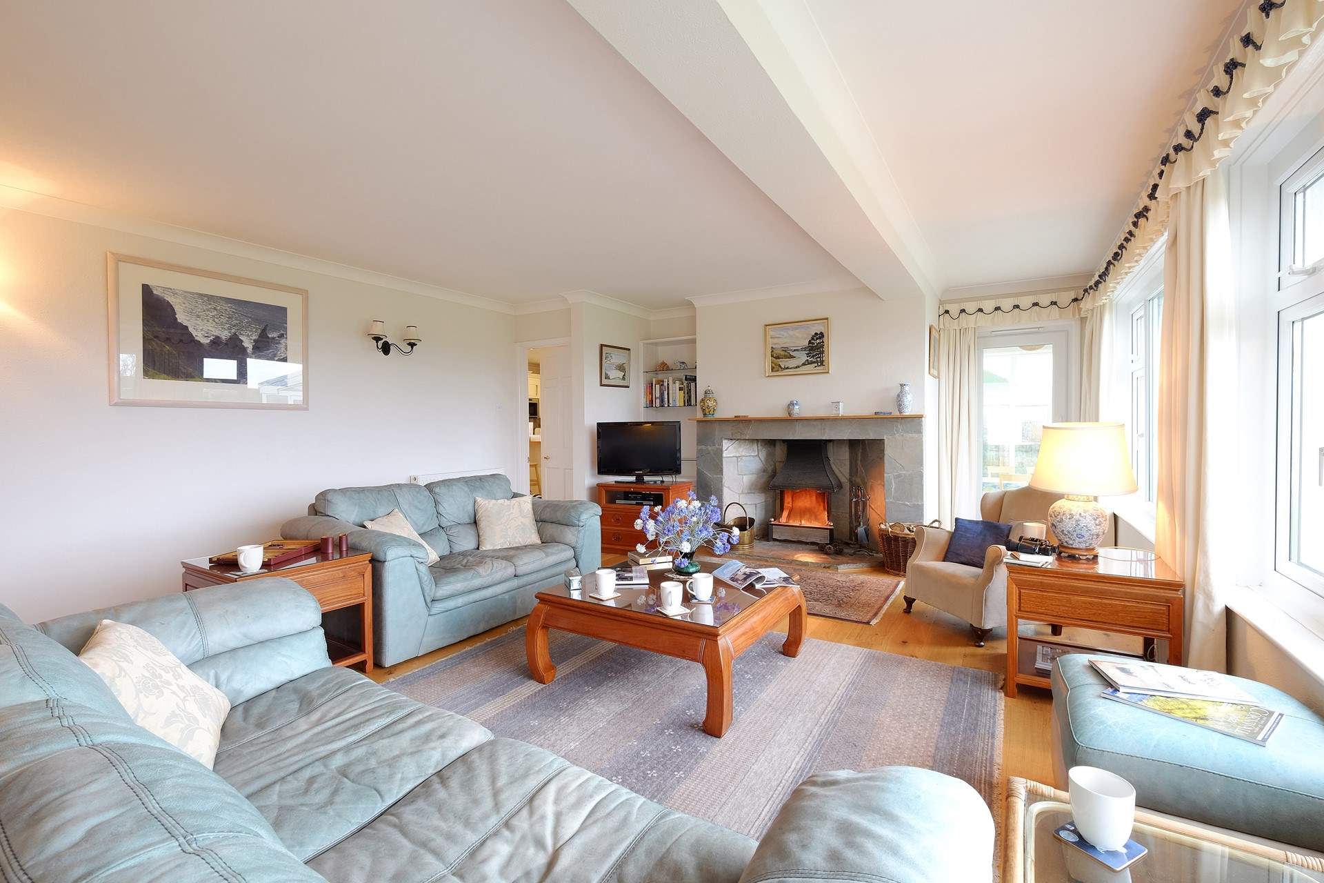 The cosy sitting-room, perfect at any time of year. 
