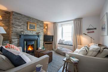 There are two sitting-rooms, this one has an open fire.