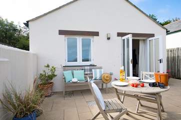 The pretty patio is the perfect spot to sit and enjoy your Cornish escape.