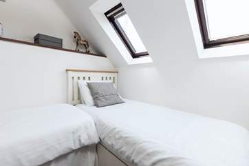 The Velux windows allow the room to flood with light.