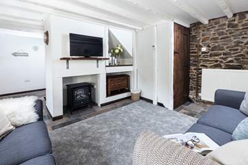 The log-effect electric stove and original charm of the cottage will be enjoyed by everyone.