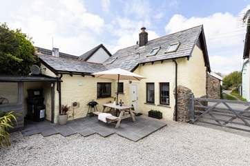 Welcome to Bluebell Cottage - the pretty enclosed courtyard is a lovely place to sit and relax.