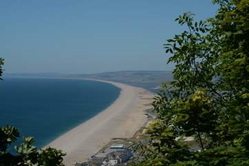 Chesil Beach stretches for 18 miles, from the Isle of Portland to West Bay forming the Fleet Lagoon inland.