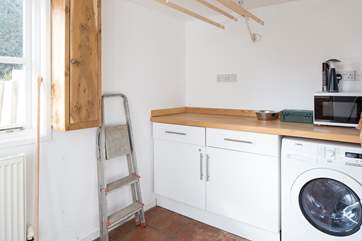 The boot-room is accessed from the back door and the kitchen, a very useful space for sandy feet and muddy paws, there is a hot and cold dog shower spray outside.