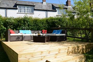 The raised decking area at the top of the garden is south facing, a great place for a morning coffee or evening glass of wine.