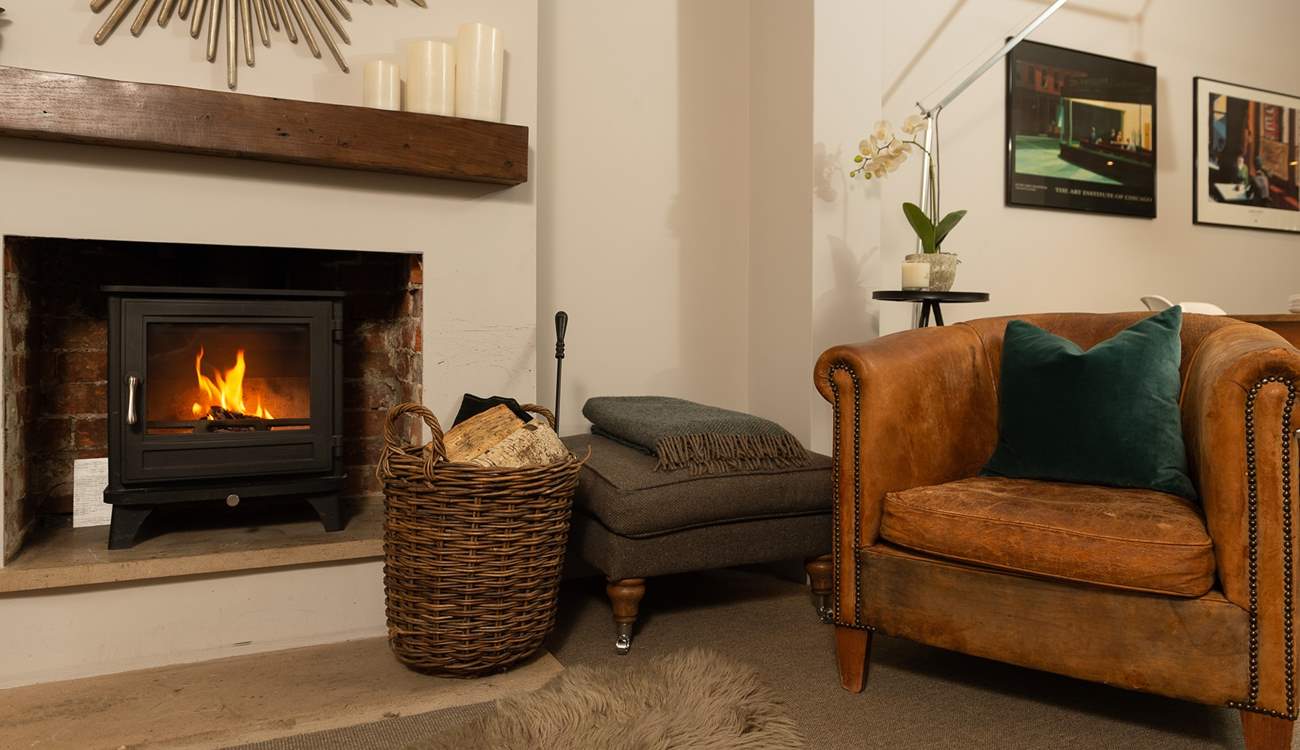 The luxurious sitting-room has some beautiful vintage features and a BOSE sound system.