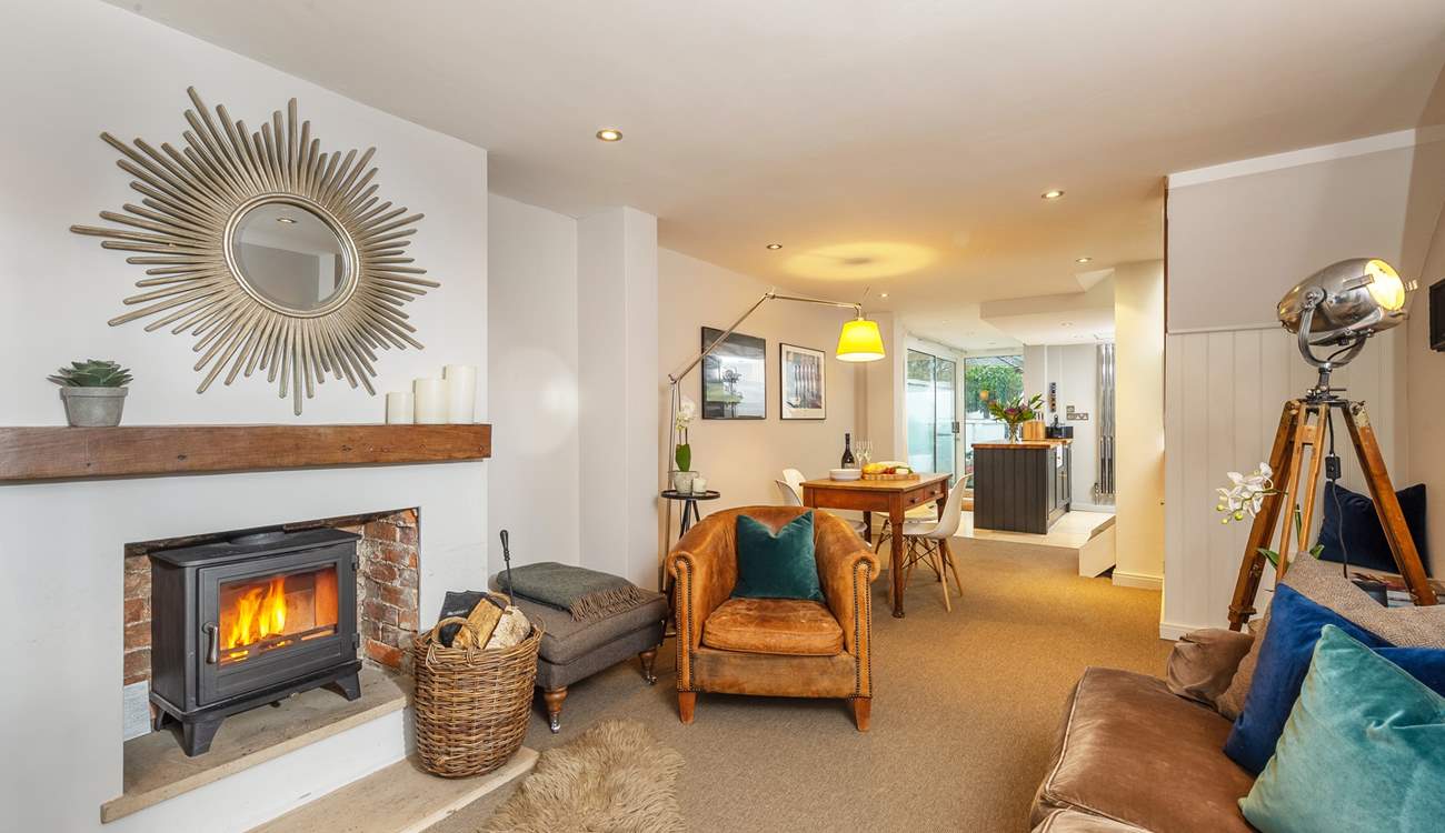 The sitting, dining and kitchen-areas are all open plan, creating a delightful space.