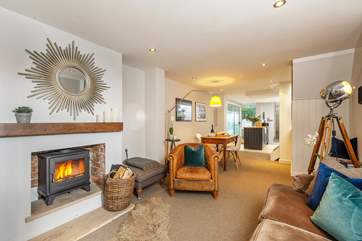 The sitting, dining and kitchen-areas are all open plan, creating a delightful space.