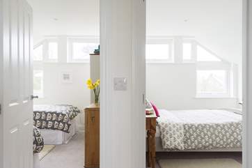 The bedrooms are next to eachother with the shower room on the left.