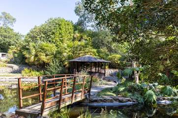 The pergola is a lovely place to sit on a sunny day.