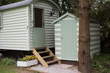 Jasmine sits in its sheltered spot with its shower cabin just a few steps away.