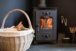 There is a warming wood-burner for cooler days (logs are included).