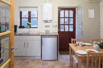 Well-equipped kitchen/dining area. Space for all to feast together comfortably.