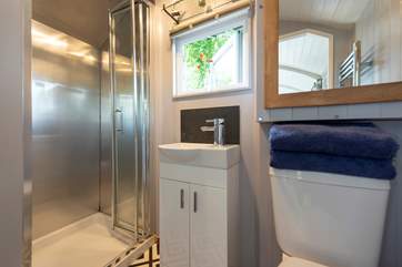 With a hot shower, wash-basin and proper flushing toilet, of course.