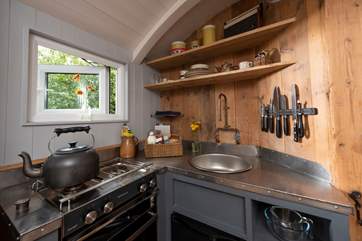 The little kitchen-area is fully-equipped with everything you will need.