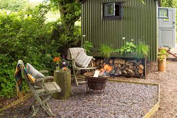 There is a fire-pit barbecue and some deck chairs for further relaxing times and a bit of outdoor cooking.