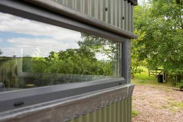 Enjoy the county surroundings from inside or out.