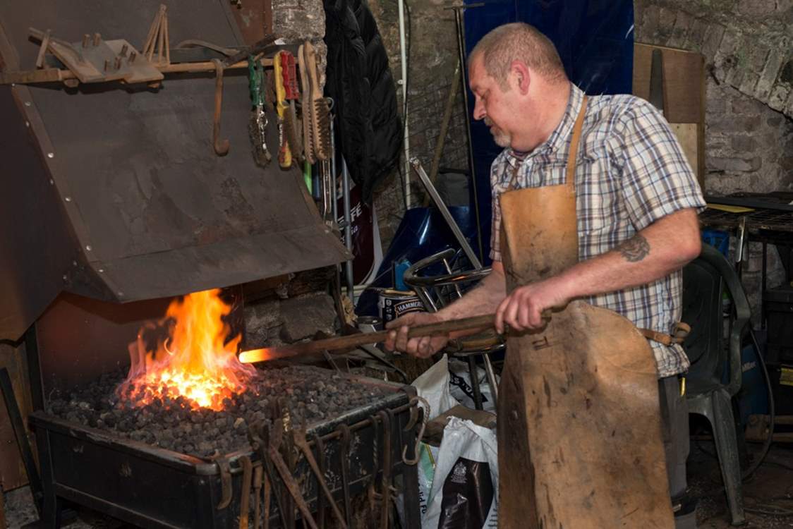 The blacksmith has a forge in the Barrow Centre.