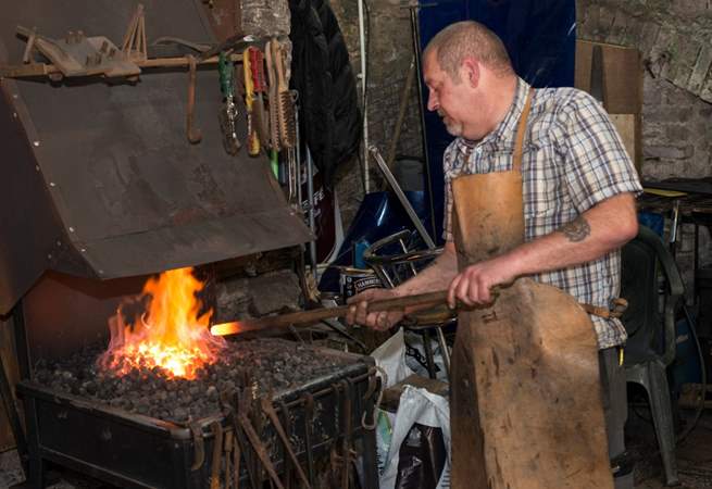 The blacksmith has a forge in the Barrow Centre.