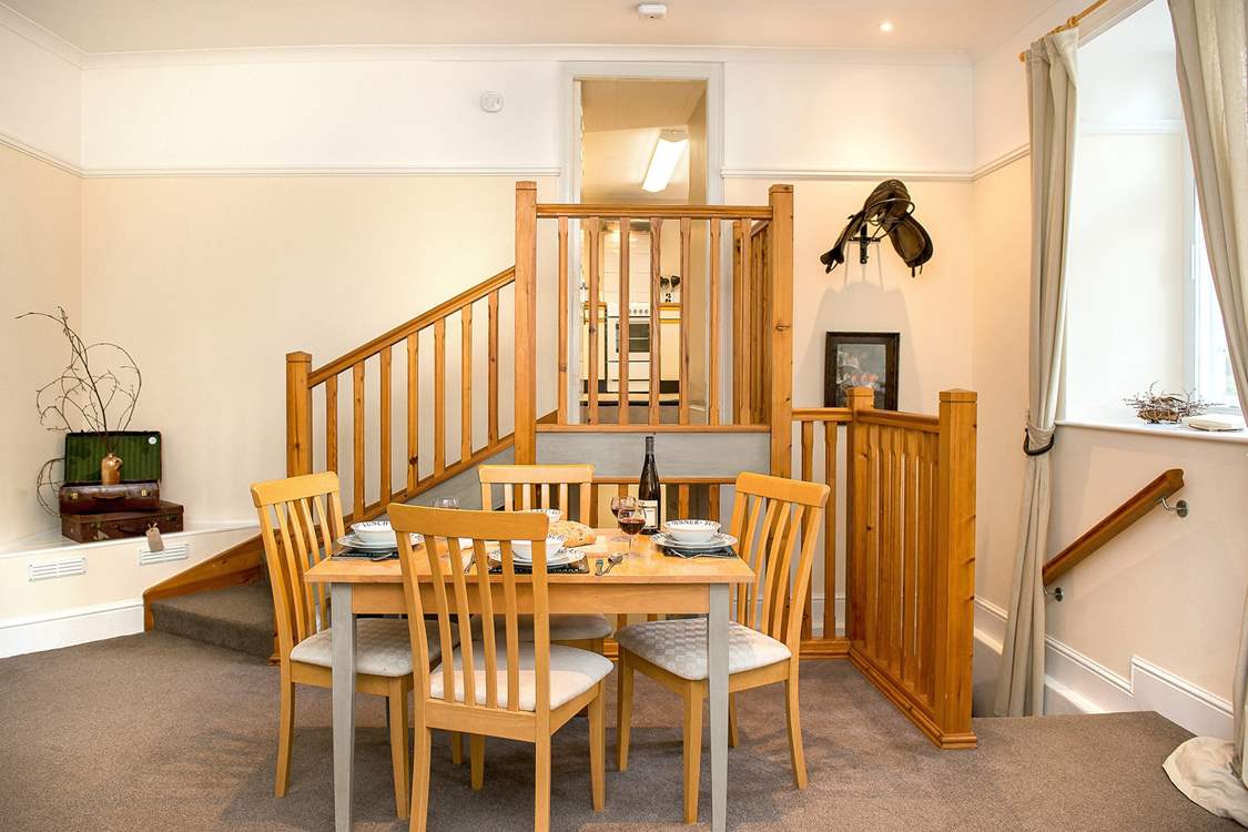 Stairs lead up to the kitchen-area.