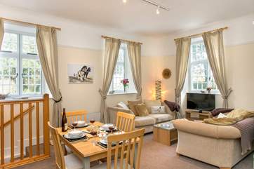 The open plan sitting/dining-room ensures you spend time together.