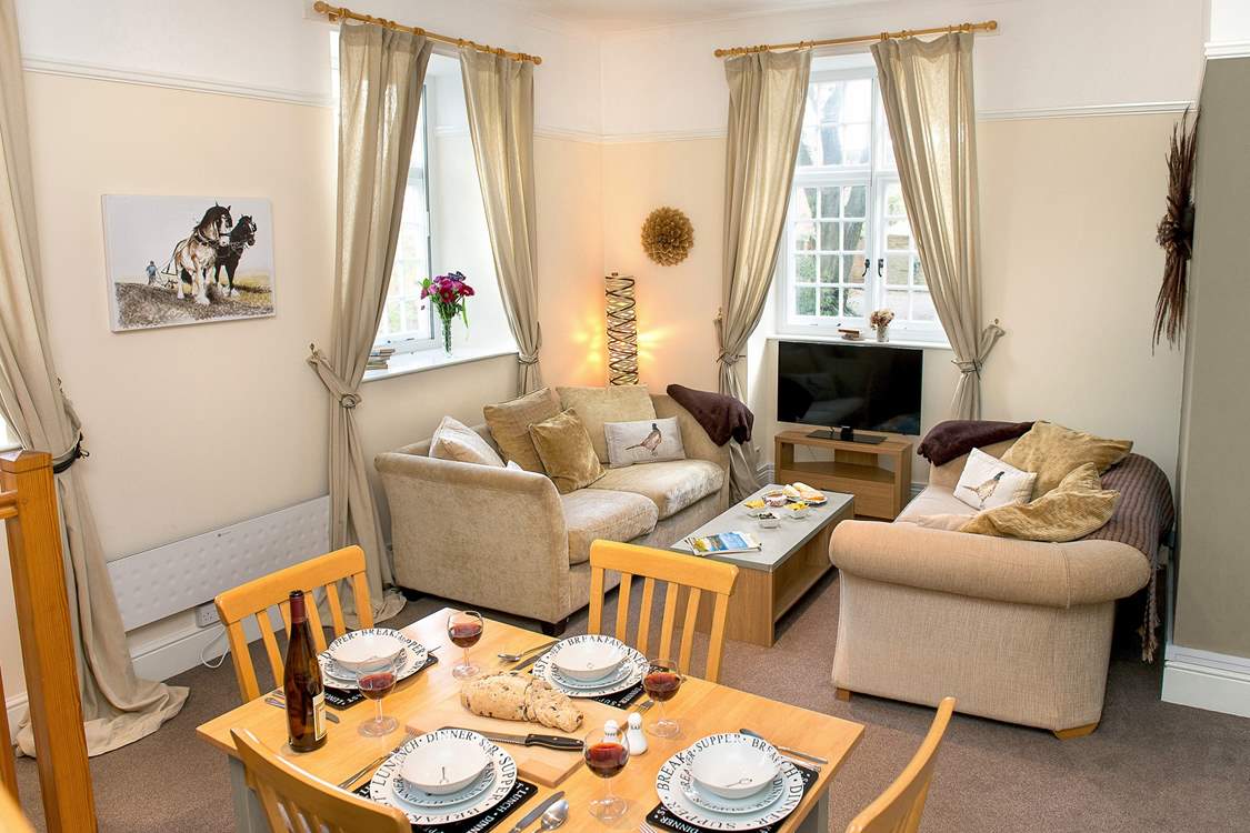 The open plan sitting/dining-room.