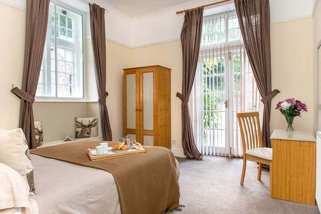 Bedroom One is wonderfully light and airy.