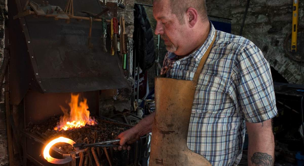 A blacksmith has a forge in the Barrow Centre.