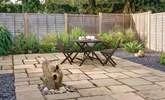 The enclosed patio area is an ideal spot to enjoy some al fresco dining. - Thumbnail Image